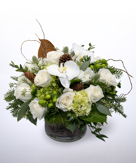 white and green woodland style floral arrangement